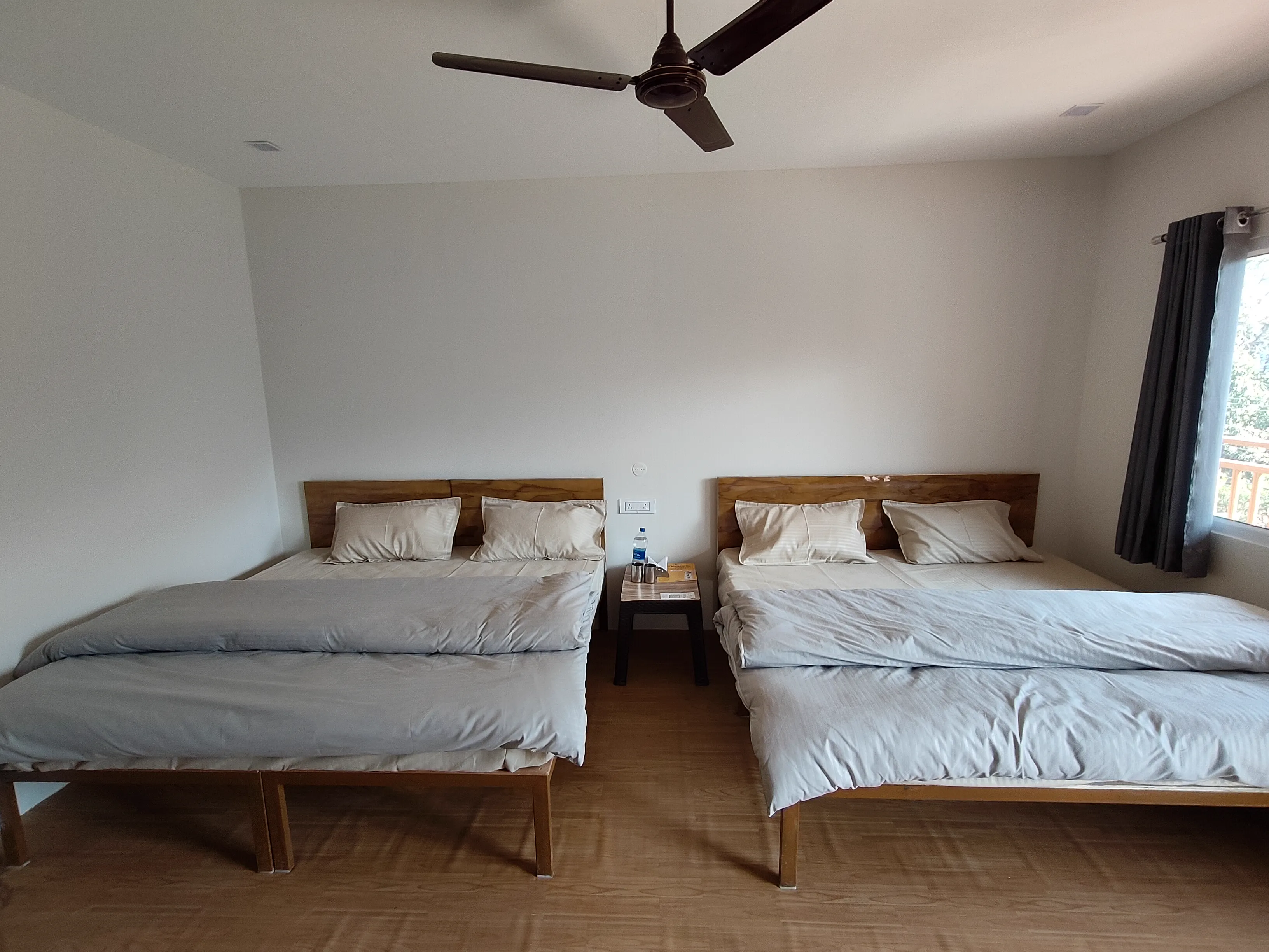 Vista King Room Lighting - Well-lit luxury room at Green Ganga Resort